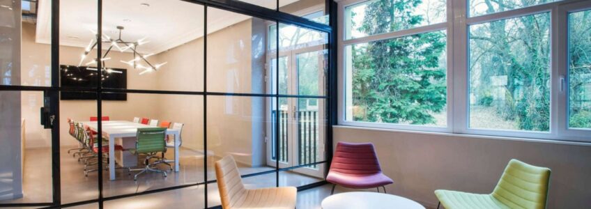 How Do Glass Partitions Enhance Office Productivity